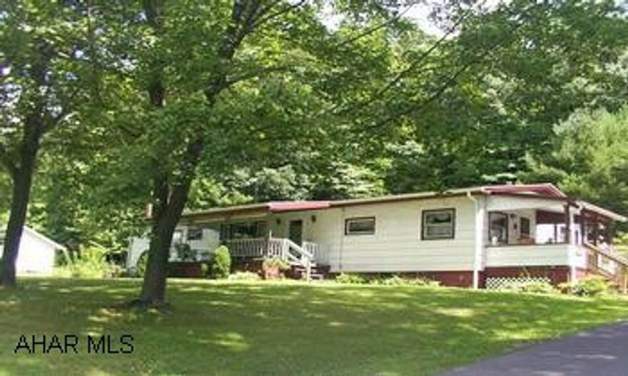 Charming country ranch on 1.54 acres, 4 bedrooms, 1 1/2 baths, covered front porch, covered back porch, full attic, 2 car garage, new blacktop circular driveway, plus 2 bedroom apartment for extra income, won't last!  Take Rt. 22 from Hollidaysburg to Beaver Dam Road on left, go  one mile , home on right, seller must find suitable housing.