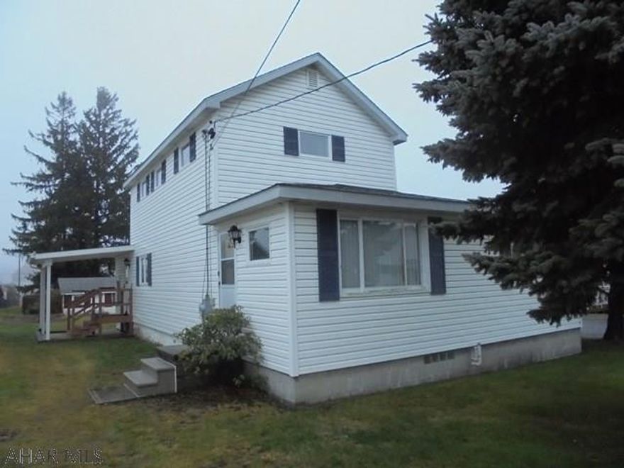 2 story vinyl sided home with a 1 story addition, featuring 1st floor master BR with 3/4 bath. 1st floor laundry. Large L shaped living room. 1 car detached garage. A must see!