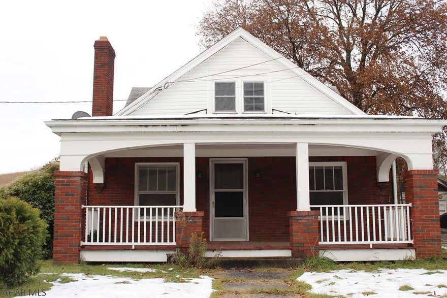 Quality built country home in Bedford county that is move in ready. Charming features such as cedar hall closet, built in laundry shoot (bathroom closet),original hardwood floors through out, built in corner cabinets (dining room) and wood burner insert. Upstairs bedroom could be turned into master suite by turning bedroom into walk in closet. 1,930sq foot Garage/Barn/Workshop which has separate 200amp electrical panel. Fruit Trees, Cement pad already on grounds for shed. Approx 30mins to Shawnee Start Park, Blue Knob State Park and Historic Downtown Bedford. Needs some TLC, but has lots of potential for someone who can envision the possibilities. The peaceful location makes this a must see home
