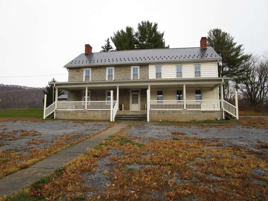 High visibility and traffic area by the Walmart Plaza and Bedford Hospital.  Office or retail building.  Was previously leased for a used car dealership.