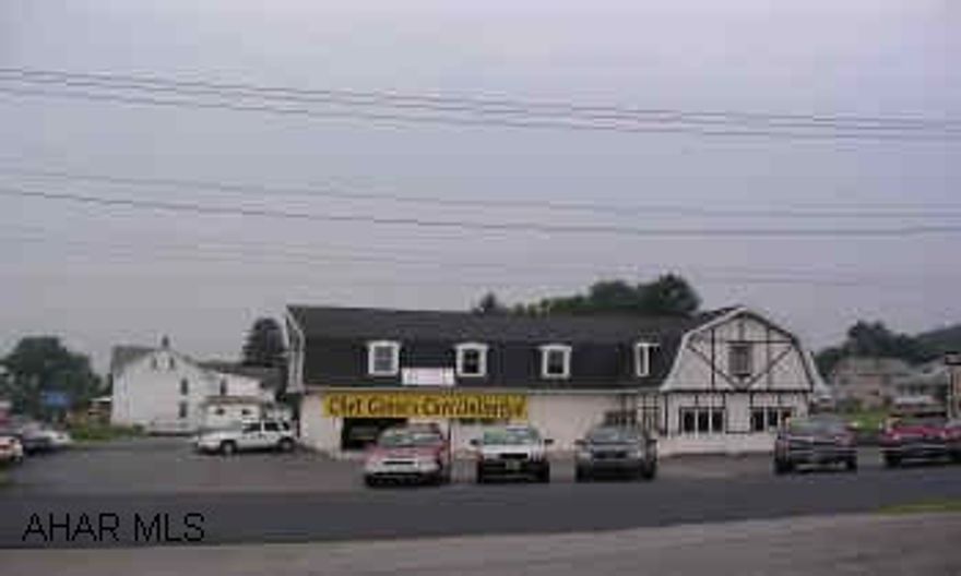 PRIME LOCATION IN PLEASANT VALLEY. CORNER OF 7TH ST. & PLEASANT VALLEY. 3900 SQ. FT. BUILDING. WELL MAINTAINED. NOW BEING USED AS A CAR LOT. ZONED COMMERCIAL. MANY OPTIONS. CONTACT SUSAN 935-8252.
