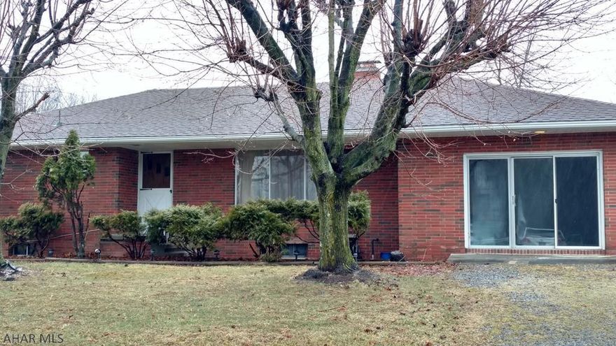 Spacious, solid brick 1 story, 3 BR, 1.5 BA, fireplace, hardwood floors, large Bonus room off Kitchen. Nice flat 1/2 acre parcel, large carport. Convenient location, just a few doors down from Peggy's Diner-Must See! Call Listing Agent for an appointment.