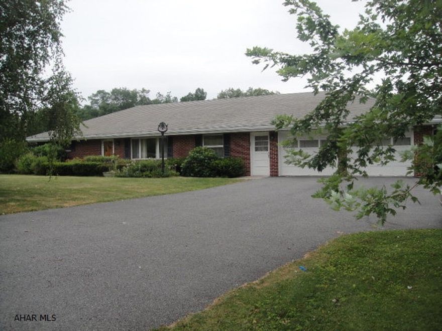 Nice brick ranch home on 0.689 ac. Kitchen, dining room, living room, 3 bedrooms and full bath on first floor. Swirled ceilings. Large 27'x 29' attached 2 car garage with inside stairway to basement. Basement is finished with kitchen, living room, 2 bedrooms, full bath and large workshop/office. Basement could be used as a separate living space. Hot water oil heat, central air, walk up attic for storage. Black topped driveway. Separate outdoor storage shed. Don't miss out on this one!