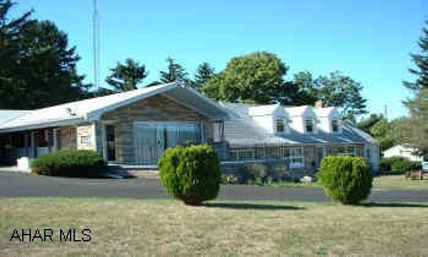 Commercial 13 unit motel/office and 1 1/2 Story Cape Cod Home. New hot water heater and furnace for motel. New roof on front half of motel, new blacktop drive and parking lot, fresh outside paint on motel. New 100 amp breakers motel and house.