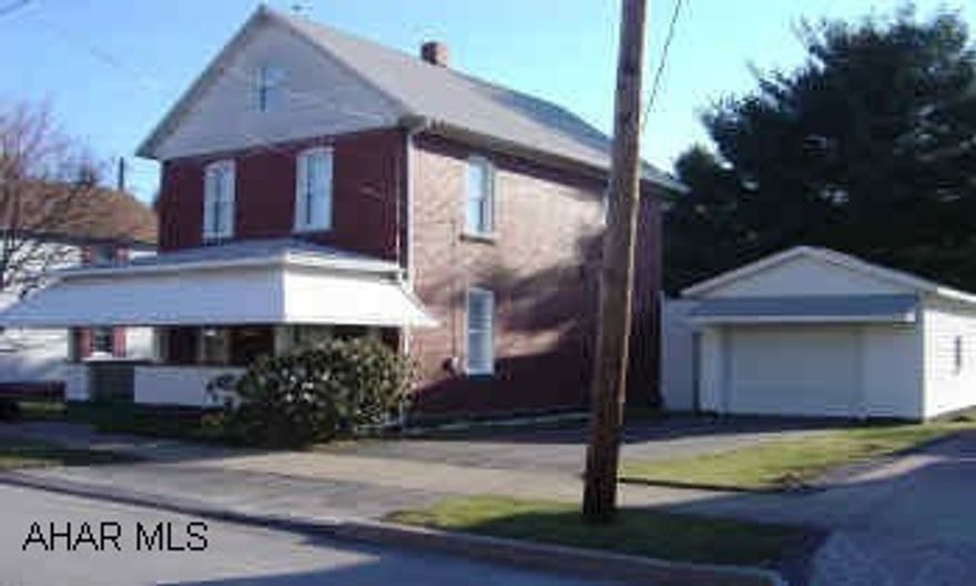 2 story, 2 bedroom home, one car attached garage, full front porch with roof. Home is in very good condition. A flood map shows the rear yard to be within a flood plain. Move in condition. Brick home, newer carpet. Kitchen is a cook in with a dining room. Mud room/laundry room first floor. The attic a stairway, floor, pannelling on walls and ceiling, could convert to a 2 room floor. There is no known insulation in the home. The walls are double brick. The basement stairway has a low clearance.