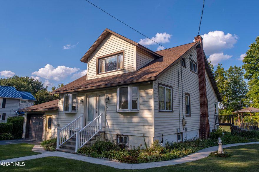 Nice Freedom Township home situated on a half acre level lot with Halter Creek running in the back yard. Home features two bedrooms with bonus room, one and a half baths, partially finished basement, main level laundry and former salon at rear of house. Nice landscaped yard with shed and both attached and detached garages. Close proximity to I-99. Spring Cove School District. Adjacent property also available.