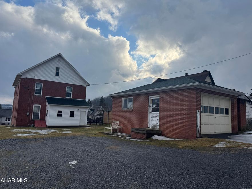 Brick 2 story home featuring 4 bedrooms, 1.5 bathrooms, formal dining room and living room. Updated kitchen. Detached garage is used as a workshop.