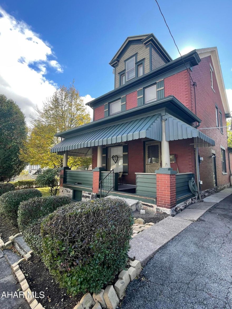 Don't miss the opportunity to view this cozy 3 bedroom, 1.5 bath, charming brick home nestled on two city lots.        The home exterior boasts a large back yard, with a pergola deck, brick fire pit, well groomed lawn, and all of it fenced-in for privacy.  In the front, an oversized shed with electric and an overhead loft offers plenty of work area and storage.  The paved area in front of the shed makes way for off-street parking for 2 cars.  In the rear, a single bay detached garage with a new metal roof, automatic door opener,  and entry to the private back yard provides access for additional off-street parking, storage, or a workshop.      The home interior has beautiful hardwood floors and trim throughout which are quite impeccable.  The downstairs area has a gas fireplace, WiFi controlled and monitored heating, a newly remodeled kitchen, a newly added 1/2 bath, and a small wall safe.  The upstairs area hosts a newly remodeled bathroom with both a large tub and a separate shower with seating.  OPEN HOUSE 12-130PM SUNDAY NOVEMBER 5TH