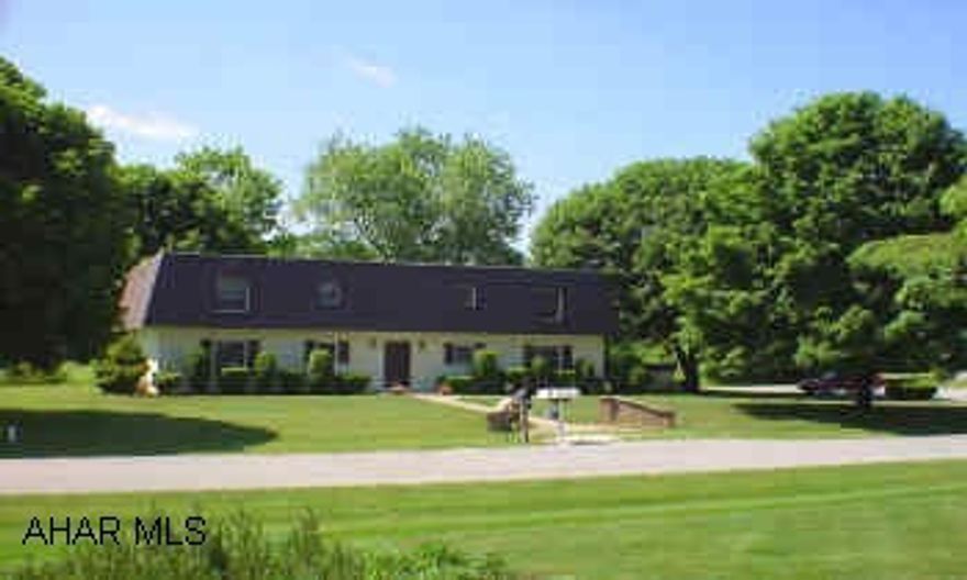 Smart 2 story, four - 2 bedroom apartments. Tenant pays heat. Large lot, very good condition.