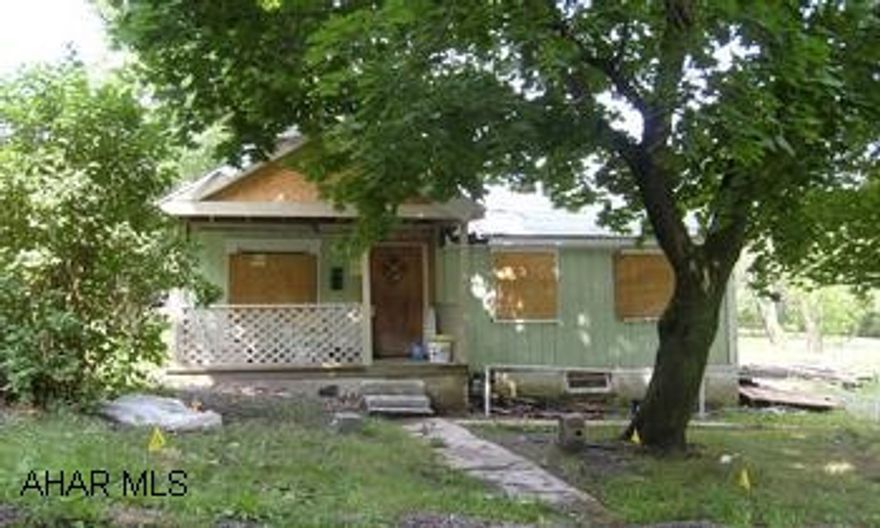 Sold As Is. This house needs substantial repairs. Call agent for details.