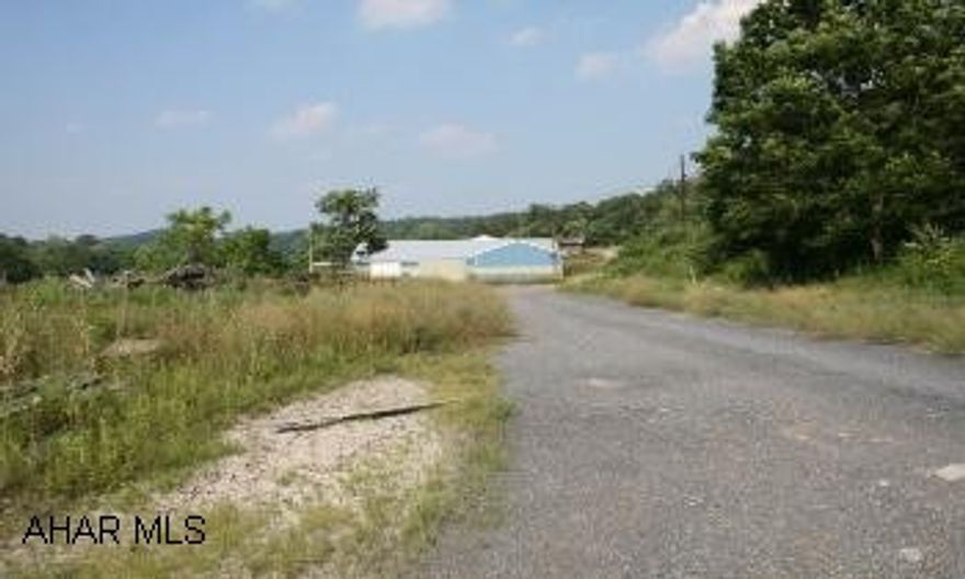 Saw mill/Storage building on 28.5 acres. Saw Mill / Storage Building 32'x89' + 53'x55' + 14'x30'  Tool / Storage building 16/x32'Garage 12'x21'Lumber storage / Grader 14'x72'