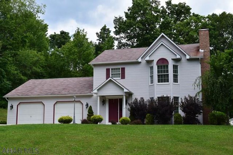 Location - Location. Located less than 1 mile from the Chestnut Ridge Schools and only minutes from I-99 for easy commutes. This great 3 bedroom home with an IN GROUND POOL has a tastefully updated kitchen with granite counter tops and has modern decor throughout. You have a two car attached garage off of the kitchen for ease of bringing in groceries, deck and patio areas around the pool and hot tub and situated on nearly an acre of ground backed up to the woods. Two heat sources to choose from and central A/C. Don't wait to see this home and miss out. Call the listing agent today to schedule a private showing.