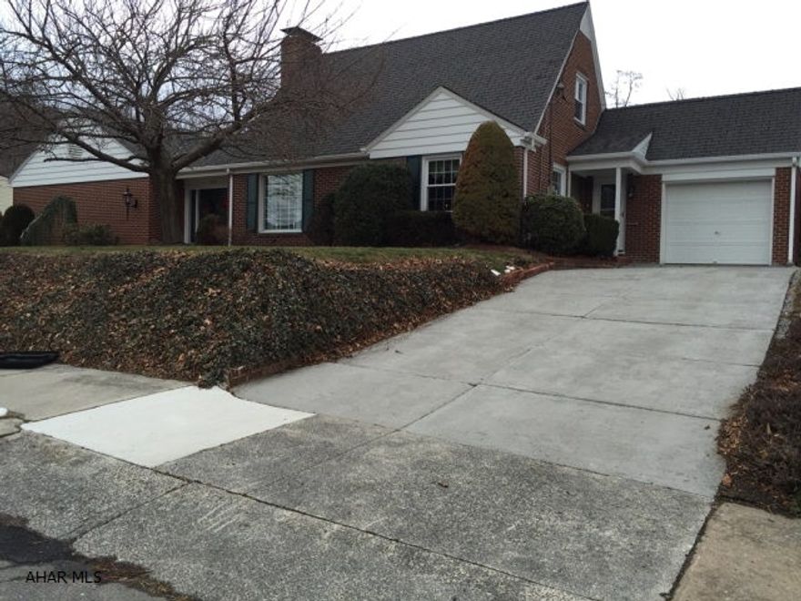 Designer Inspired Home! This impressive cape cod home has incredible curb appeal, wonderful open floor plan and a great in town location. A huge first floor master suite includes a very large bathroom, dressing room, three closets and a walk out to a private patio.  Gorgeous hard wood floors grace the large family room, dining rooms, stairs and upper landing. A three seasons sunroom is found just off the living and kitchen areas. Two nicely sized bedrooms with plenty of storage share a full bath on the second floor. Finished lower level family room adds additional living space to enjoy. Large flat lot adds to the overall appeal. New natural gas furnace, central air, windows, doors, flooring and much more make this a must see home.