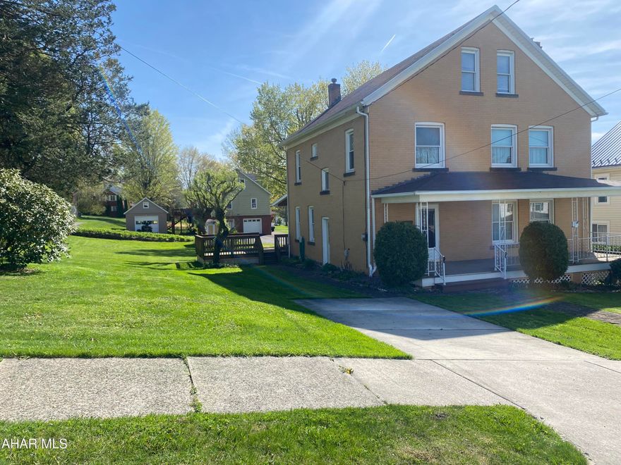 Welcome home to this large, spacious brick beauty offering an exceptional blend of classic charm and ample room for modern living. Situated on a generous, flat lot in Cresson Borough, this property provides plenty of space for outdoor activities and gardening. Enjoy the tranquility of a large, covered front porch, perfect for relaxing evenings. The sizable back deck is ideal for entertaining guests, hosting barbecues, or simply unwinding in your own space.  Step inside to discover an expansive first floor designed for comfort and growing families. The living room provides a warm and inviting atmosphere, complete with a cozy pellet stove for extra warmth during the winter months. The dining room is spacious enough to accommodate a large gathering table, perfect for family dinners and holiday celebrations. A convenient half bath on this level is ideal for guests. The large, eat-in kitchen has an abundance of cabinets for storage and vast countertops for meal preparation. Upstairs, you will find four large bedrooms, offering private spaces for everyone. A renovated full bathroom serves this level.
The walk-up third floor provides even more potential. While not heated, it features a versatile bonus room and a large area for all your storage needs.
This home is perfect for those seeking space, comfort, and potential. Don't miss this Cresson Borough gem!