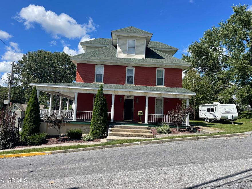 With a little over 3000 square feet, this well maintained stately brick home is one of the largest in Lilly Borough. If you are looking for a home with plenty of family living space this is the one for you!  The first floor is perfect for entertaining family and friends, the sizeable dining room can accommodate a large table and is connected to the spacious kitchen, with a door that leads to the wrap around porch. A first floor 3/4 bath is positioned in the middle of the home.  The expansive living room is the entire length of the home with doors that lead to a patio area that sits on top of the rubber roof.  The second floor has 2 very large bedrooms, a full bath with a claw foot tub and a master suite with jacuzzi tub and separate shower.  The third floor is fully finished with walk in closet and a half bath.  The basement has the laundry area, a 3/4 bath, and plenty of room for storage. Also included in the sale is a second parcel of land that used to have a trailer, the utilities are still available for that parcel.  If you are a train enthusiast as you can see them from many places in this home.