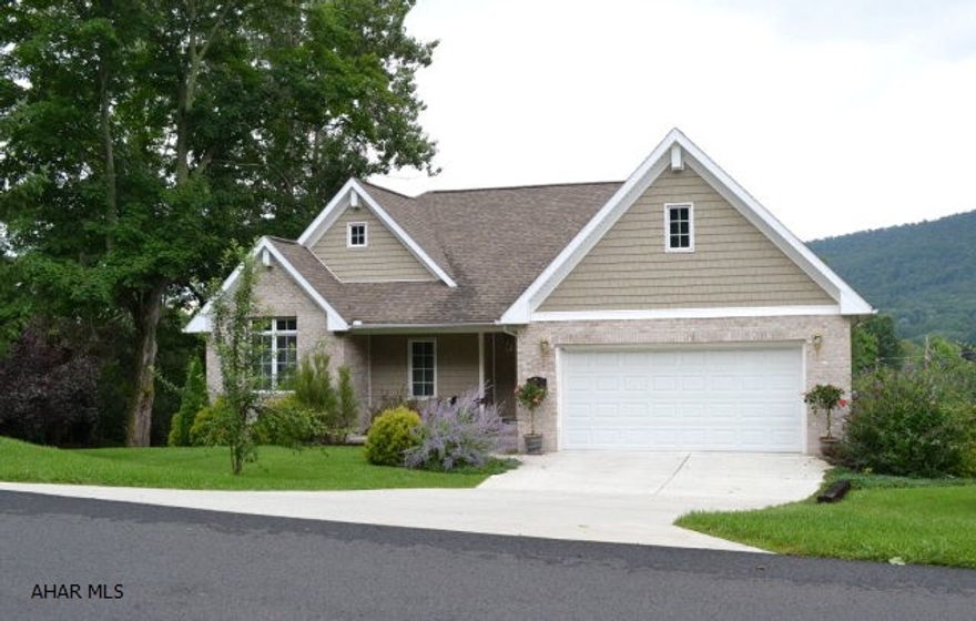 Generous living space in this 4 bedroom, 2.5 bath home in Bedford Borough.  Open kitchen and living areas with oak cabinets, dark granite counters, stainless appliances, walk-in pantry, hardwood floors, and custom gas fireplace with builit-ins.  Full master suite with walk-in closet, tray ceilings and garden tub.  Full finished,walkout, basement.  Rec room, bedroom,and bath.  The fenced back yard has multi-leveled deck, play equipment, and room for a hot tub.  Full 2 car attached garage, concrete driveway, central VAC, Central AC, and much more.