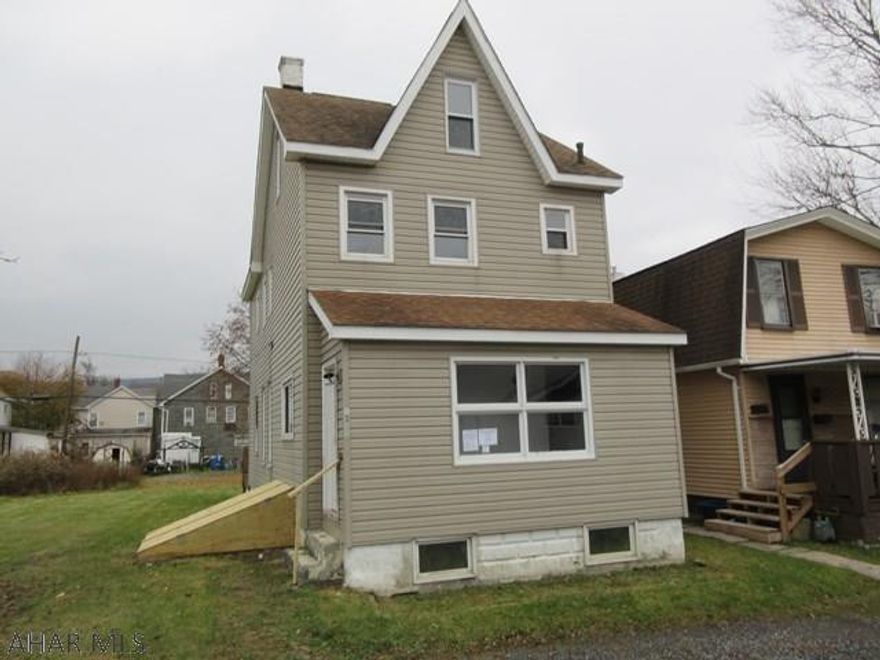 2.5 Story vinyl Juniata home in need of TLC. Vinyl exterior, some replacement windows, finished attic with heat, nice yard and rear deck. Property sold AS-IS. Seller will make no repairs. Offers must be submitted through HUD approved broker. Buyer pays both transfer taxes. Equal Housing Opportunity.