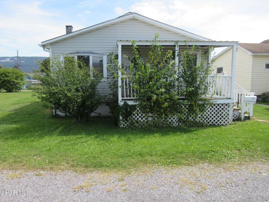 Bellwood Borough 1 story home needs some TLC, but fantastic neighborhood with loads of possibilities! Features large living room with adjoining office area and large eat-in oak kitchen w/ laminate floors. 2 bedrooms and modern bath plus nice, level fenced yard with deck. AS-IS sale. Seller will make no repairs.