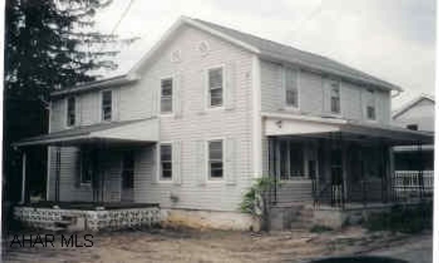 Two-story vinyl home. 5 BR/1 1/2 BA.