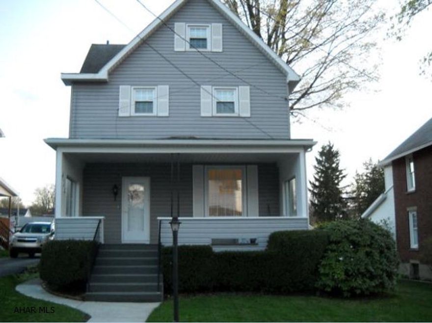 Beautiful 4 BR.3 story home that boasts remodeled kitchen & 1st floor bath, hardwood floors,beautiful woodwork, new drywall. Move in and enjoy the shade on the 12x14 covered deck or the sunshine on the uncovered 8x10 section. 2 car detached garage. Priced to sell @ 139000.