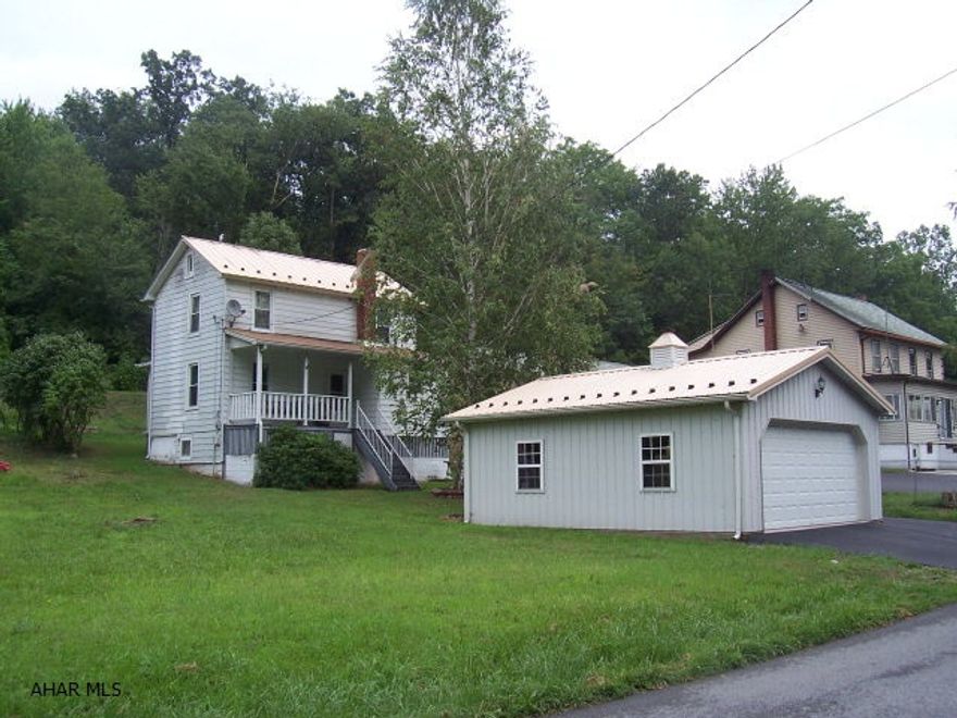 Great starter home or a perfect hunting and fishing retreat!!! Very nice and well maintained home with a Honey Oak kitchen. Spacious 2 car detached garage with openers. New furnace and duct work 2006. City sewer, new water pump and well tank, newly paved driveway for off street parking. Laundry in basement.  Only 10 miles from to Lake Raystown Resort, within minutes of State Game Lands and located next to the Raystown Branch of the Juniata and near Yellow Creek. Abundance of Fishing and Hunting all around.