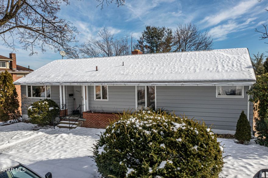 A bright, cheerful and beautifully maintained ranch home in Altoona. 4 bedrooms, 2 bathrooms. Spacious rooms and beautiful hardwood floors throughout. Open living room space has a lovely fireplace and a large bay window that reveals a fantastic city view. The semi-finished basement offers lots of storage and opens to a covered patio and lawn. Updated bathroom, new kitchen counters, and 2 car garage with rear alley access.