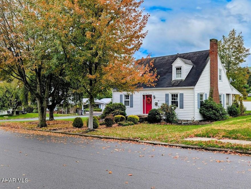 Take a look at this lovely cape cod style home situated on a beautifully landscaped corner lot just a short walk to downtown Bedford. Upon entering the front door, you'll be greeted with an expansive living room with a gorgeous centered brick fireplace. From there head into the dining room with it's own built-in corner cupboard and access to a cozy covered porch overlooking a fenced yard with wonderful plantings still in bloom. Off the dining room is the spacious family room with cathedral ceiling, large windows with views of the yard, and a skylight. The kitchen comes with all appliances, a convenient desk area, and an abundance of lighting. Just off the kitchen is a laundry area and oversized half bath leading to the first floor bedroom with gorgeous wood floors. Upstairs you'll find two additional large bedrooms with nice closet space and a 3/4 bath. A two car garage and breezeway leading to the back fenced-in yard are just a few more things that make this home a must have. Call for details and to schedule your tour.