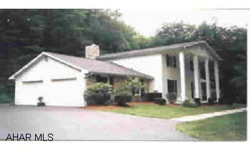 Private setting and only 9 miles from Altoona. Family room with fireplace, 1st floor laundry, woodburner in breakfast nook, paved driveway and two trout ponds.  All this and much more on over 11 acres. $5,000 allowance toward furnace repairs and carpet. Private setting and only 9 miles from Altoona. Family room with fireplace, 1st floor laundry, woodburner in breakfast nook, paved driveway and two trout ponds.  All this and much more on over 11 acres. $5,000 allowance toward furnace repairs and carpet.