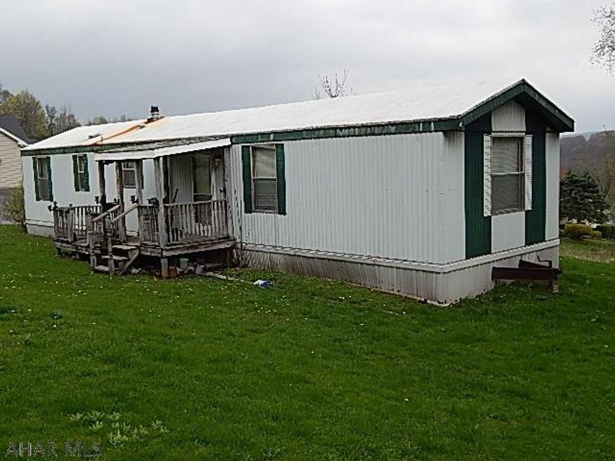 Home is in need of TLC or this would be a perfect lot for a new home.