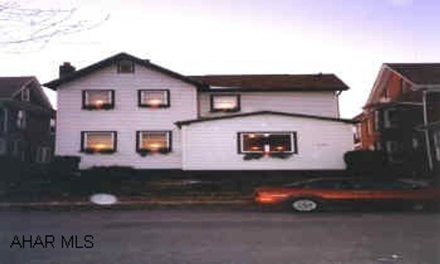 2 STORY VINYL WITH DETACHED 2 CAR GARAGE. SUPER 2 BEDROOM VINYL SIDED, NEWER ROOF, WINDOWS, GOOD MECHANICS.