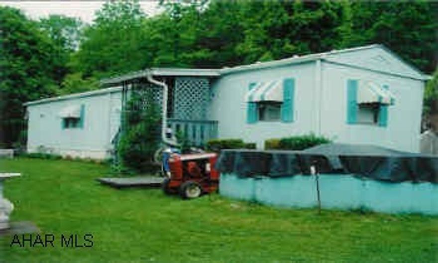 12x60 Mobile Home, fully furnished, all appliances, many out buildings, carport, well maintained, wooded lot, 4.114 acres, fruit trees and more Sale & Settlement Of Other Property Contingency (with right to continue marketing)  SSP-CM
