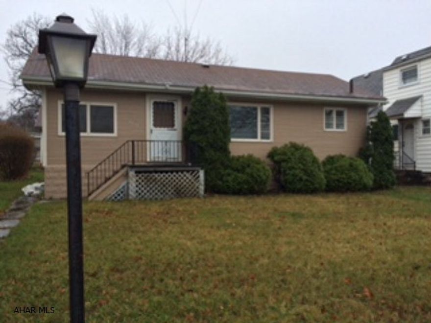 Priced to Sell! Fresh new paint in the kitchen, living room, bathroom and both bedrooms. New carpet in the living room and in both bedrooms. New flooring in the kitchen too! Don't forget the garage with its large storage area.