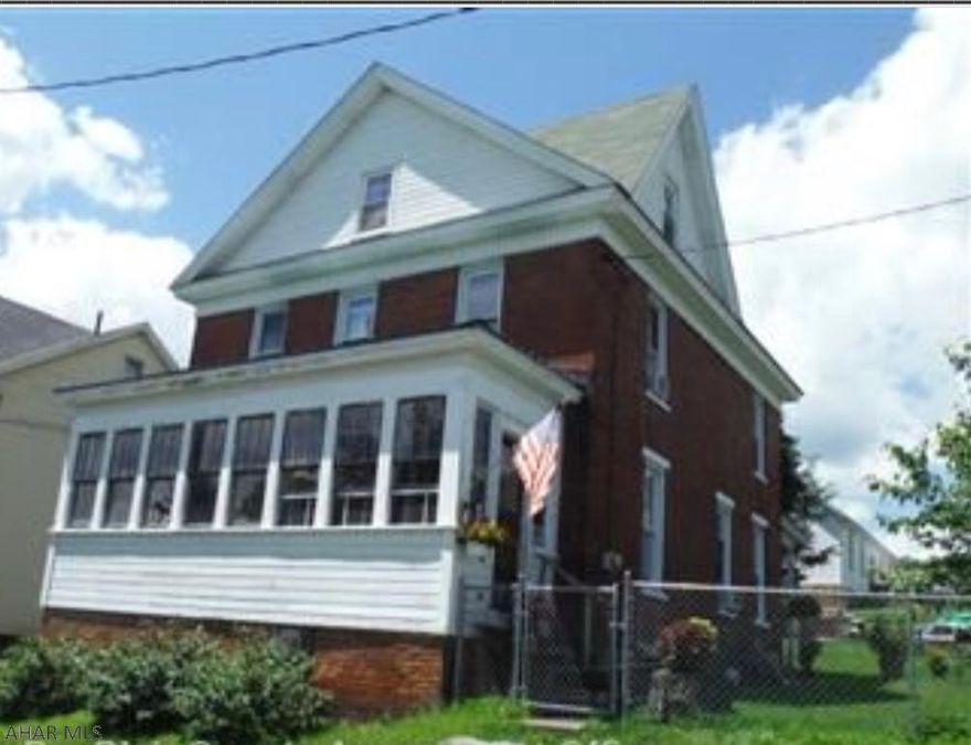 Nice 3 story home, needs TLC could make a nice investment property. Could be a duplex.