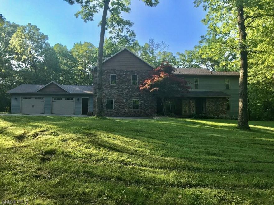 Stunning 4 bedroom, 5 bathroom home resting on 10 acres in Hollidaysburg.  This beautiful home offers an Eat In Kitchen, bright living room with an abundance of natural light, a family room with a pellet stove, and 4 fabulous bedrooms. In addition to all of this, there is an office, two decks, a finished basement and a 2 car garage! This home is updated from top to bottom.  Bring your offers and pack your bags!!!  There is nothing to do but MOVE IN!!