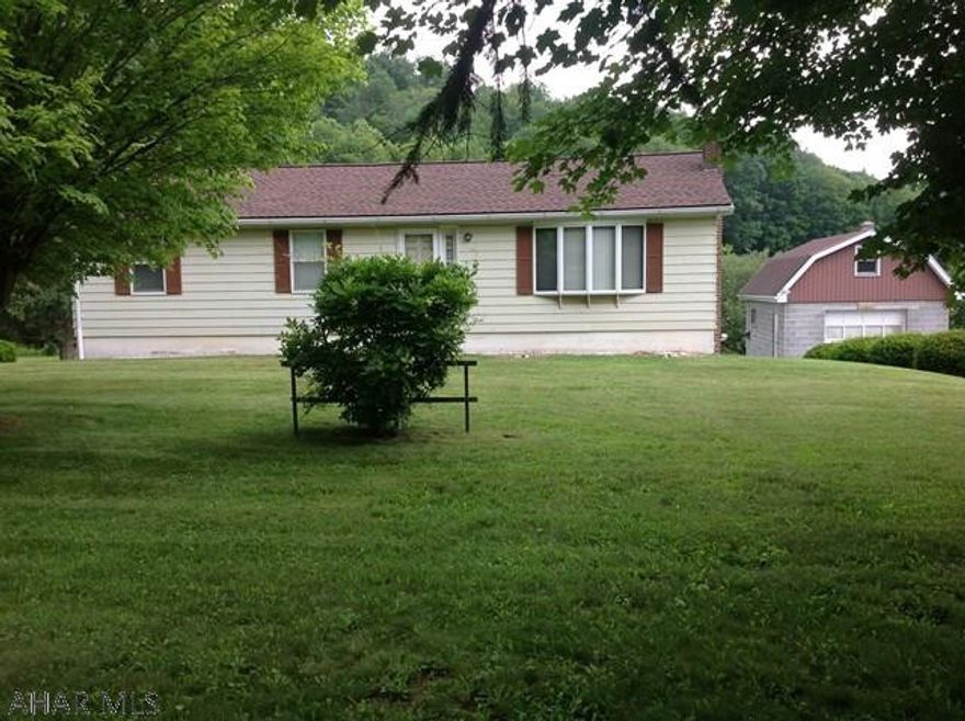 This nice location ranch home with 4 BR , sits on a spacious 1.5 plus acre is close to town and yet still in the country. Nice workshop in garage . This property has a finished basement and a circular driveway....MUST SEE