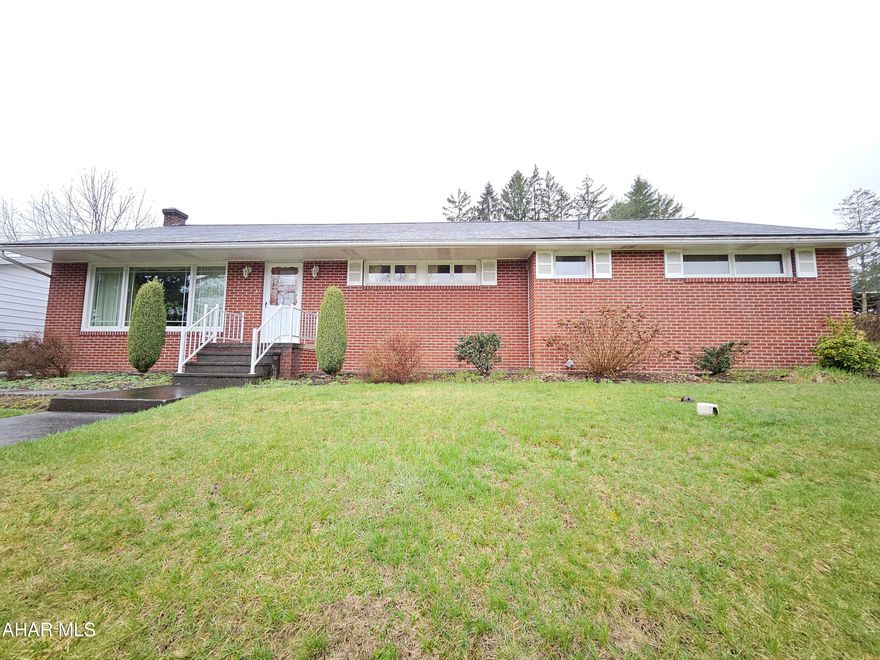 Welcome to this generously sized all-brick ranch home, built in the 1950s.  While this charming home retains its timeless brick exterior and spacious layout, it's ready for your personal touch to bring it into the modern era.  
With 3 bedrooms and 2 bathrooms, this home offers a floor plan that can easily accommodate both family living and entertaining. The large living room features original hardwood floors under the carpets. 
 The adjoining dining area provides space for gatherings. The eat-in kitchen has ample storage and is ready for a fresh update that will make it shine.
The full basement and attached garage add even more potential for storage, a home gym, or a recreation area. Outside, the sizable backyard is perfect for outdoor entertaining or a garden.
Located in a sought-after neighborhood with easy access to I-99, this home is a fantastic opportunity for someone looking to create their dream space in a well-established community.
With its solid construction and spacious rooms, this home is waiting for someone to make it their own and unlock its full potential. Don't miss the chance to transform this charming ranch into your perfect home!