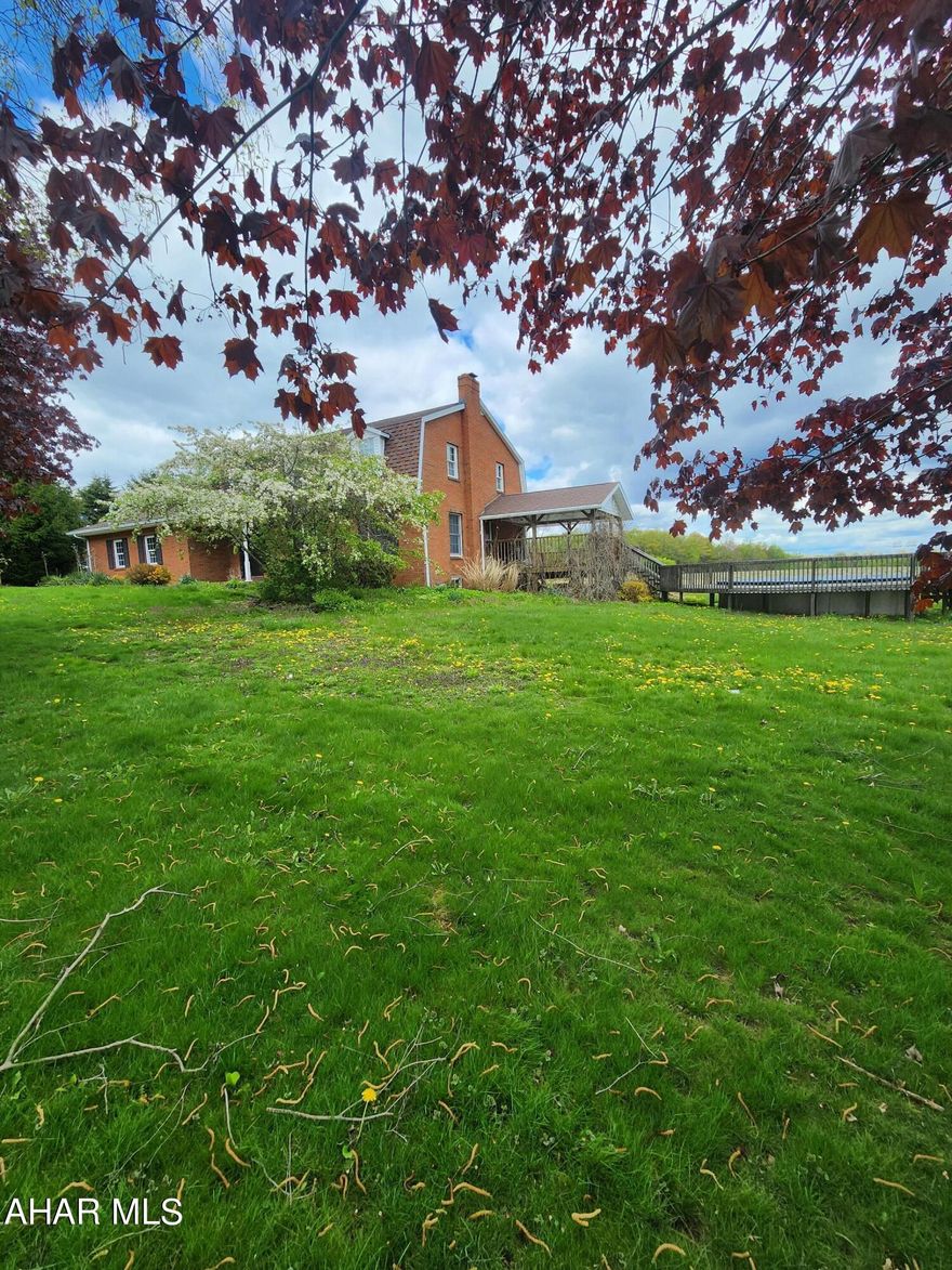 Two story brick home situated on just shy of an acre. This home boasts 3 large bedrooms on the second level and a full bath. First floor step into a welcoming foyer with beautiful French doors ,2 large living  rooms and an open concept Kitchen and dining room. Basement is fully finished with a family room, 3/4 bath and laundry room and a bonus room. Outside enjoy the covered deck that leads to the above ground pool. This home has so much to offer come and take a look.