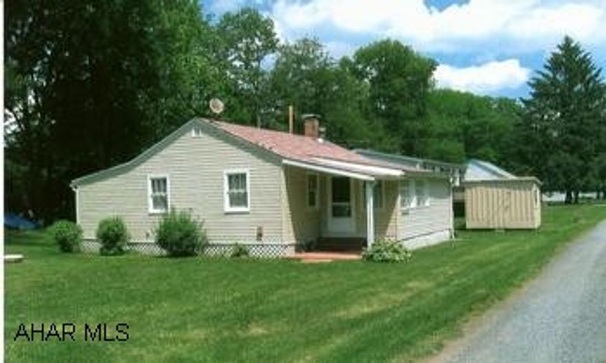 Stream side cozy cottage in fantastic shape. Fishing, boating, swimming, 120' of water frontage, 2 sheds. Newer capets and laminate flooring. Upgraded electric service 100 amps.