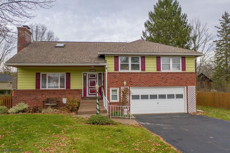 Unique multi-level home (5) is situated on a large level lot with fenced in backyard and pond near the Hollidaysburg Football Field. The bottom level features a custom built rec room with separate TV area. The 2nd level has a laundry room and remodeled bonus room  with 1/2 bath that exits to a covered porch and an adjoining sunroom.  The main entry level has a large living room with fireplace, dining area and kitchen with a walk-in pantry and 1/2 bath. The 4th level has 3 bedrooms and full bath.  And the 5th level has a large master bedroom, skylights, and full bath with Jacuzzi bathtub/shower and walk-in closet.  There is an amazing amount of storage space too.  The 12 X 14 2-story mini-barn has a small deck on 2nd floor and electric.  This house is so much bigger than you would expect.