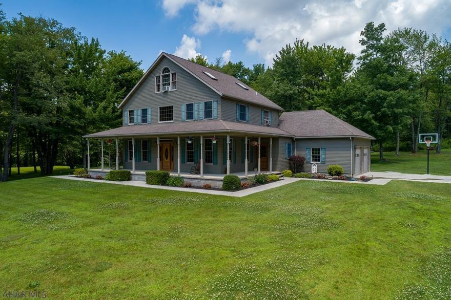 Private cozy custom built home with country charm. 5 beautiful level acres. Family room w/ fireplace, oak cabinetry kitchen,  oak trim through out. Spacious 2 car attached garage and a 1 1/2 detached garage.