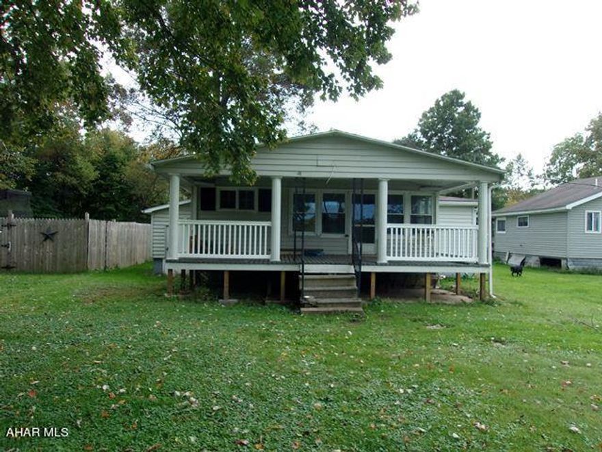 Cute cottage by the creek!!! This interrupted renovation project just needs you to finish it to fit your vision of the perfect waterside getaway. Currently has 2 bedrooms, but another could easily be added by utilizing some enclosed porch area or taking some space from the LR.  Change the cupboard plan in the enlarged eat-in kitchen or leave it as it is.  Bathrooms, laundry, and kitchen have been framed in, but those ''walls'' can be moved to accomodate YOUR wants and needs.  Come take a look.  MAKE IT YOUR OWN!!!