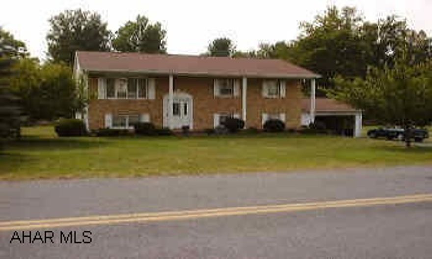 Beautiful and spacious brick/vinyl split entry on a large lot with stream in rear.  Finished lower level includes family room, rec room, 4th BR or den, work room and laundry room.   Large brick/vinyl split entry with 3 BR, 2.5 bath and possible 4th BR in lower level.  Finished lower level includes family room, rec room, laundry room, den or 4th BR and work area.