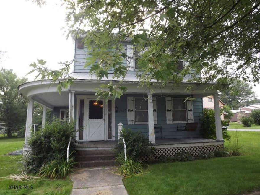 Convenient location - walk to store, post office, bank and Shawnee Park! 1st floor laundry, eat-in kitchen. Nice size rooms. Needs TLC. As Is sale.