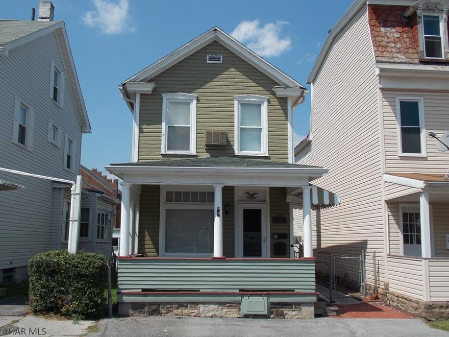 Bigger than you may think, this 2BR/1BA home is freshly painted inside and has new front and back doors The roof was put on both the house and garage in 2012 and the water heater was installed in 2014. The detached two car garage is a bonus with a huge finished room above for Dad or the kids.The garage has been rewired and has new lights and doors.  Remote openers could easily be added. This is a great stater home that has had the same owner since 1952. Don't wait this home will not last at this price.  Cash or conventional sale please, As Is Sale.