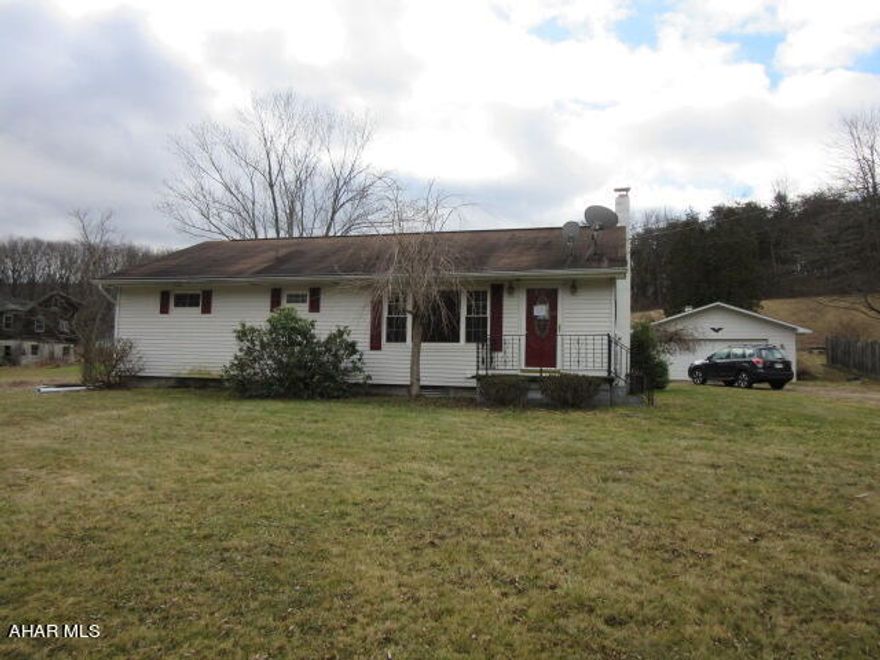 The septic failed a dye test in 2018. A system would need installed. Ranch home with oversized detached garage, 3 bedrooms, 1 bath, hardwood floors