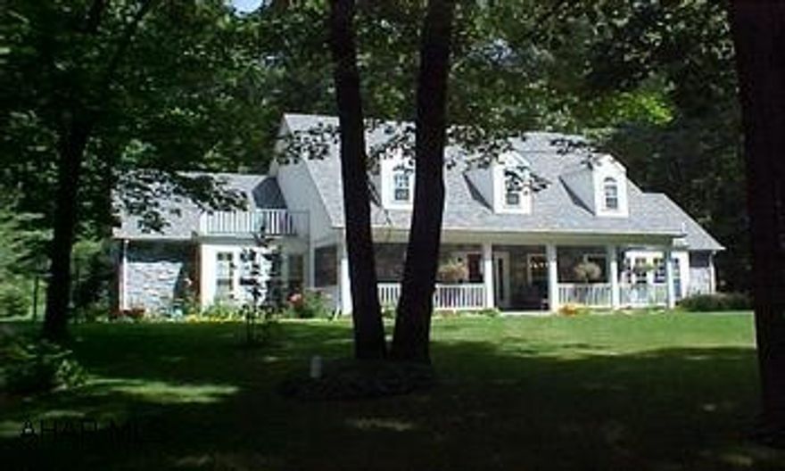 Oak trim - solid Oak Doors.  Attached garage additional 572 sq ft.  Blacktop Circular Drive.  Rt 36S to Ore Hill flashing lite R Cross Cove Rd, L next Rd, L at Stop onto Frosty Hollow Rd, L on Dogwood, home on L. Bloomfield Twp.  Bedford Co.  2.5 miles to Ironmasters Golf Course.  #J-890.