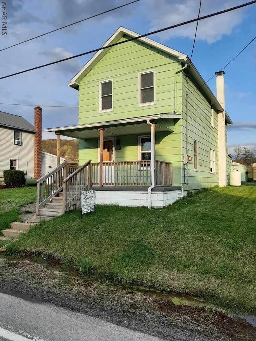 Come check out this great starter home or investment property! This home is very sturdy. Just needs some cosmetic touches. Main living area is spacious for entertaining with access to covered front porch. Or use the enclosed back porch with access to flat back yard for outdoor dining or just relaxing. Upstairs you will find 2 large bedrooms and 1 captive bedroom. This room would make a nice dressing area or walk in closet. Also a nice sized full bathroom with plenty of storage. There are also hardwood floors under all the carpet. Also a concrete parking pad in the back alley for 2 vehicles. Cute home with plenty of potential! Call for showing today!