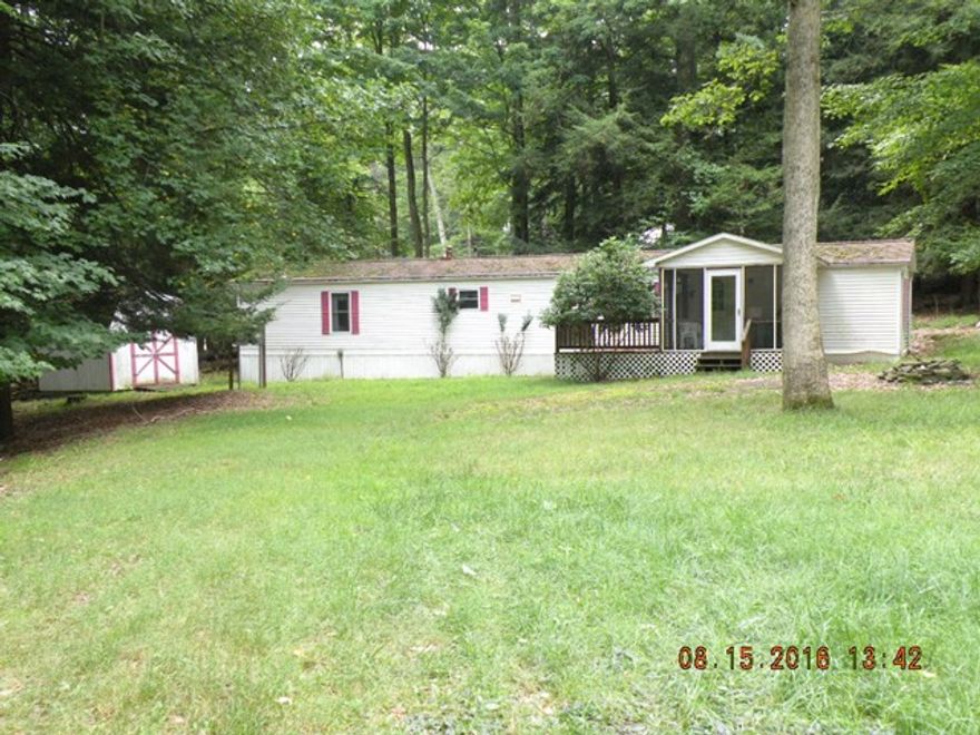 nice mobile home (14x70) on large lot on Glendale Yearound. All new plumbing!This home has 2 large BRs & 2 full baths, large LR w fireplace. Minutes from Prince Gallitzin State Park Adj to game lands & Rock Run ATV trails. Property has issues- LOOKING FOR OFFERS!