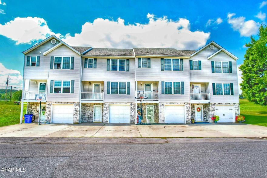 Own your own home with little maintenance! This two story townhouse has gray vinyl and stone siding. Front balcony and rear, wooden back deck with Sunsetter retractable awning. Pull into the concrete drive with parking for two or into the integral car garage. Walk in foyer at ground level, with room to hang your coats and leave your shoes. Lots of storage under the stairs and behind the garage. Built in 1998, this home has only had 1 owner! Central air less than 10 years old. All new windows have been put in since it was constructed, top to bottom paint, new insulated french doors in the living area. 
This home boasts a nice size living area with access to the deck, dining area and eat in kitchen. The kitchen comes with white appliances and new plank flooring. Double windows to let in all the morning sun while drinking your coffee and reading the newspaper. Pantry area and front balcony from the kitchen. A powder room to round out the first floor.
The second floor has berber carpet throughout, 3 bedrooms all with lighted closets, a full bath and laundry closet along w/ a master bath with double sinks and a window.
This home has it all. A great school district and beautiful homes and farmland surrounds this spacious home that is waiting for you to call it yours!