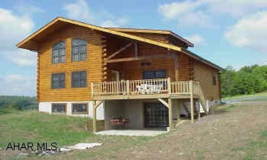 New log home with a million dollar view!!!  beamed  catherderal ceiling, hickory kitchen cabinets, all on 3 acre lot.